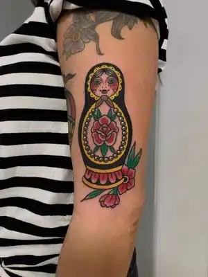 Traditional colour tattoo of a matryoshka doll