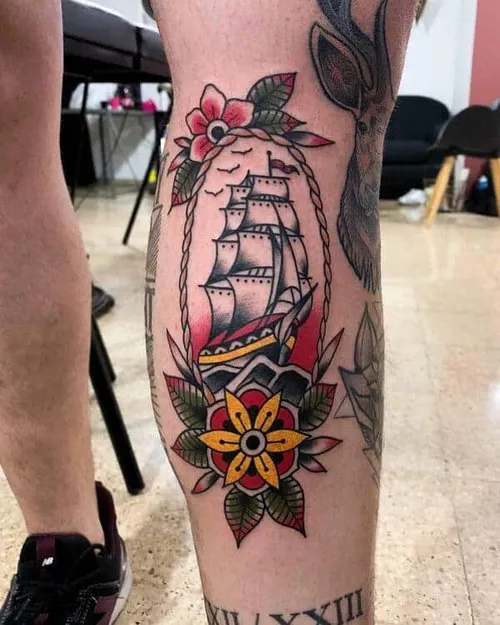 Traditionell tatuering av en segelbåt