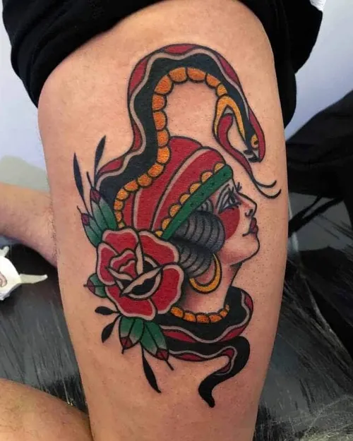 Traditional tattoo of a girl and a snake