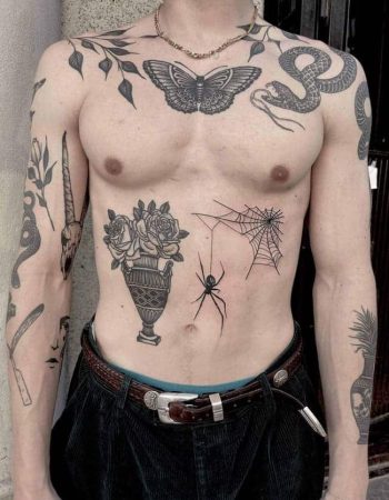 blackwork-tattoos-on-a-males-upper-body